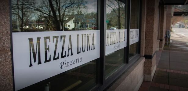 A photo of Mezza Luna Pizzeria