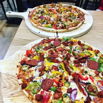 A photo of Veggie Supreme Pizza