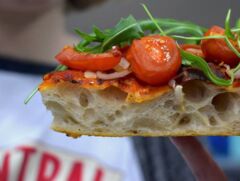 A photo of Baked Pizza Al Taglio