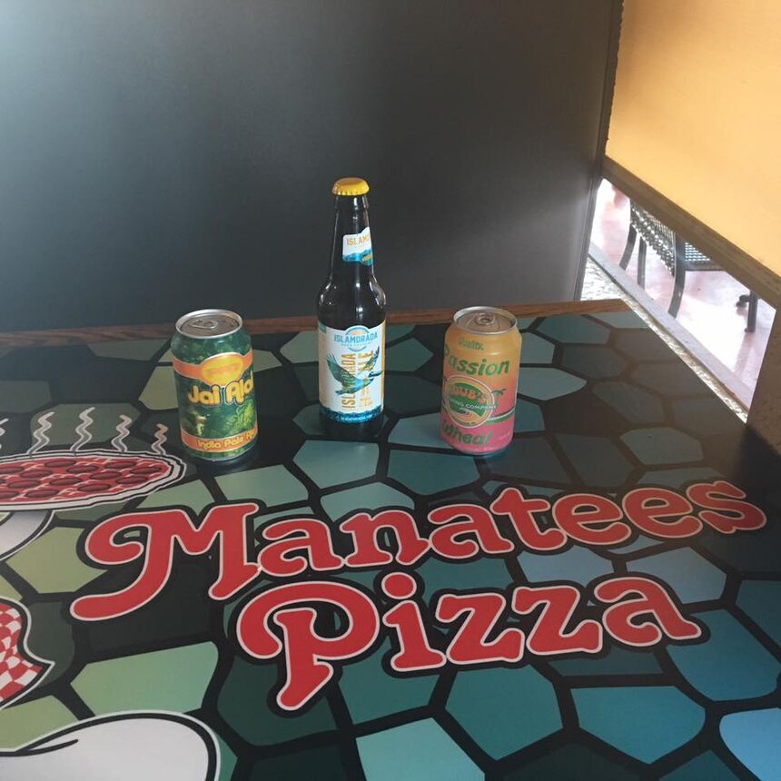 A photo of Manatees Pizza