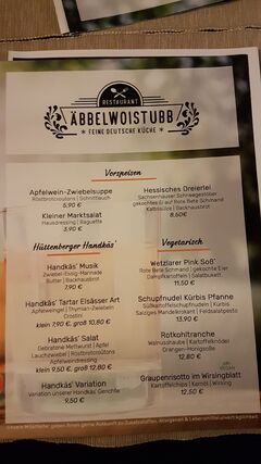 A menu of Äbbelwoistubb