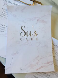 A menu of Su’s Café