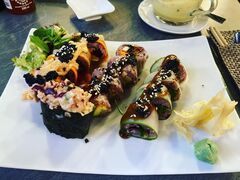A photo of tiger club vegan sushi